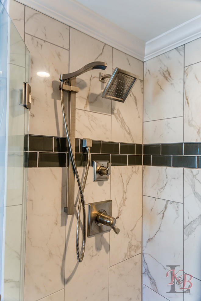 Example of a mid-sized transitional porcelain tile and brown floor eat-in kitchen design with an undermount sink, recessed-panel cabinets, white cabinets, quartz countertops, gray backsplash, subway tile backsplash, stainless steel appliances, an island and white countertops