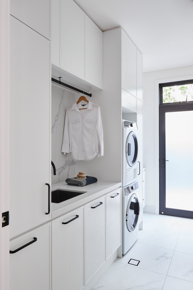 Design ideas for a contemporary laundry room in Sydney.