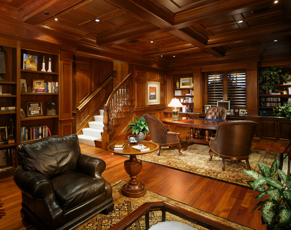 Inspiration for an expansive traditional home office in Denver with dark hardwood floors and a freestanding desk.