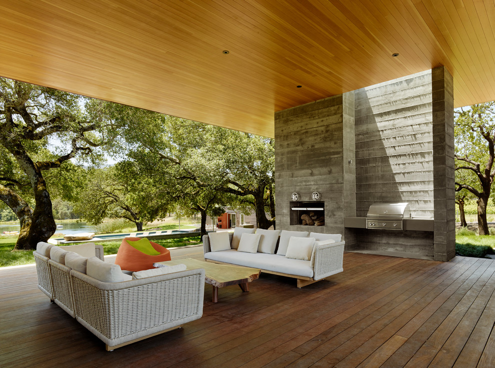 Inspiration for a contemporary deck in San Francisco with a roof extension.