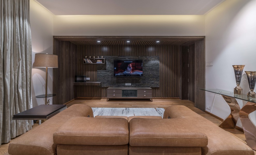 Design ideas for a contemporary family room in Hyderabad.