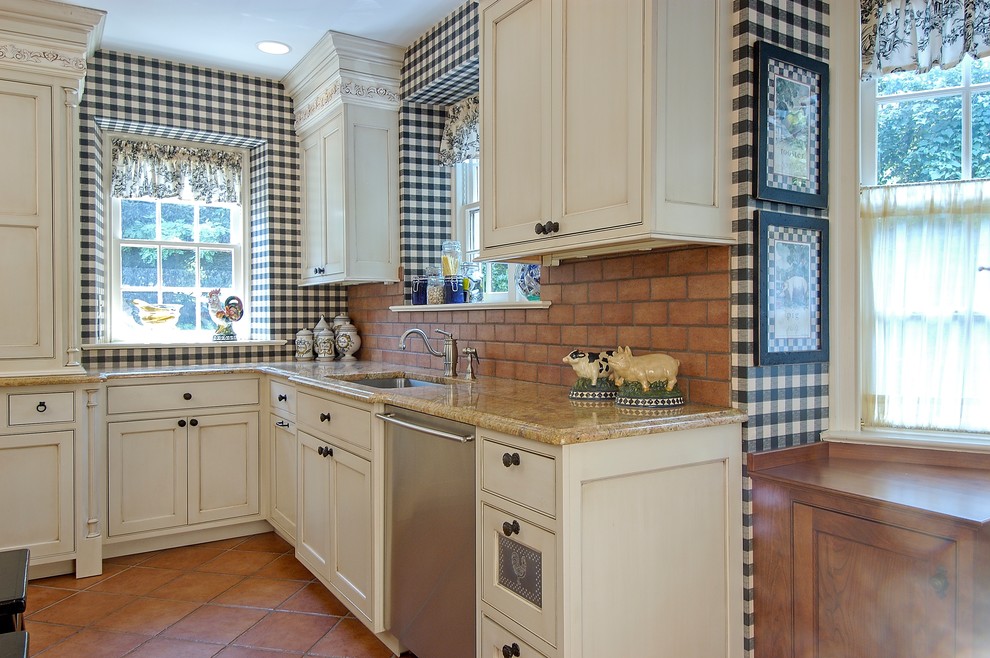 This is an example of a traditional kitchen in Philadelphia with granite benchtops.