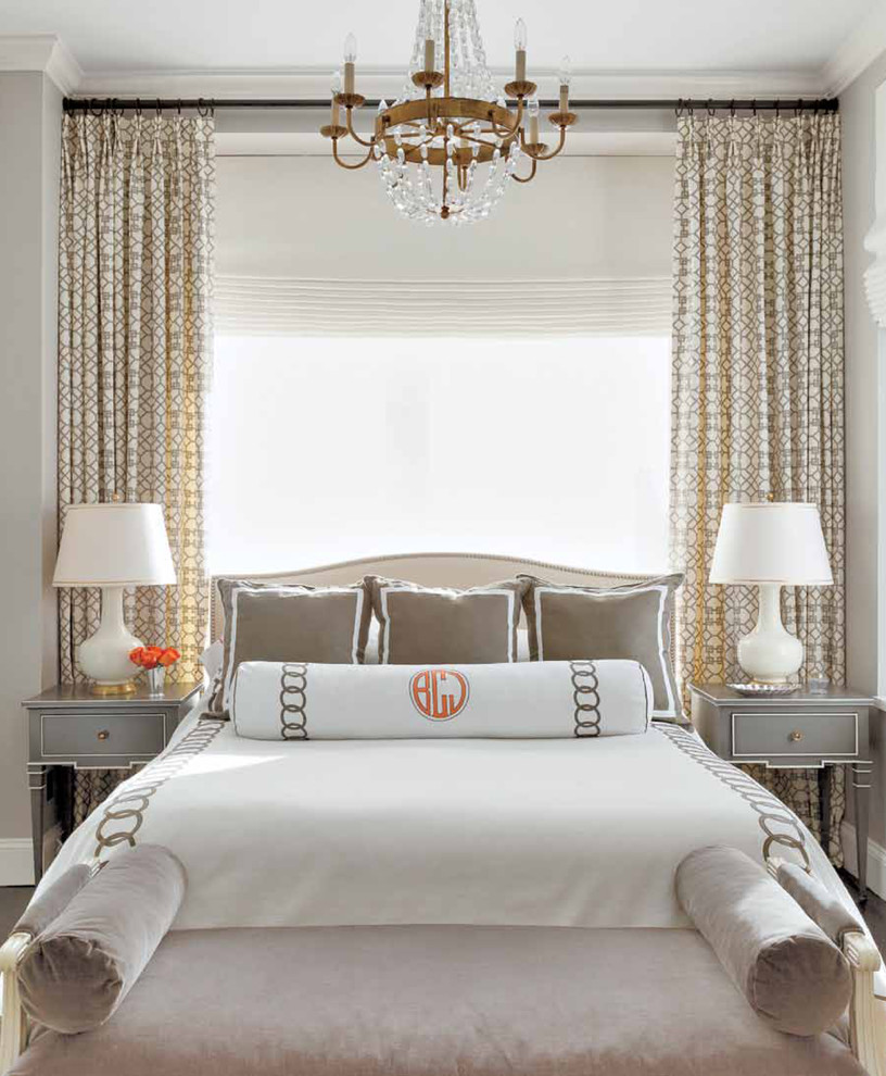Inspiration for a traditional master bedroom in New York with grey walls.