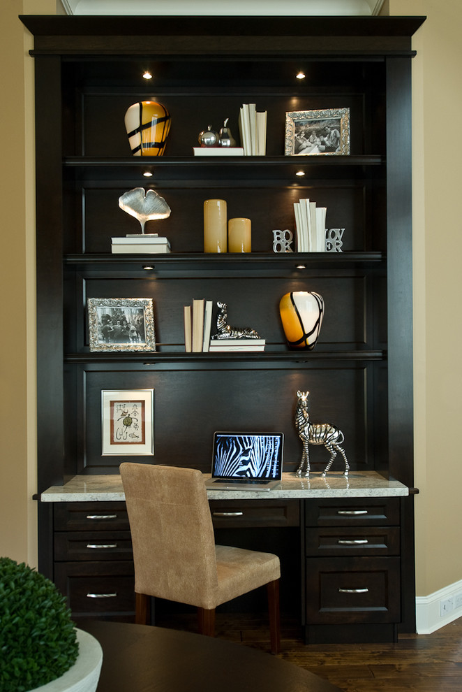 Design ideas for a contemporary home office in Vancouver with a built-in desk.
