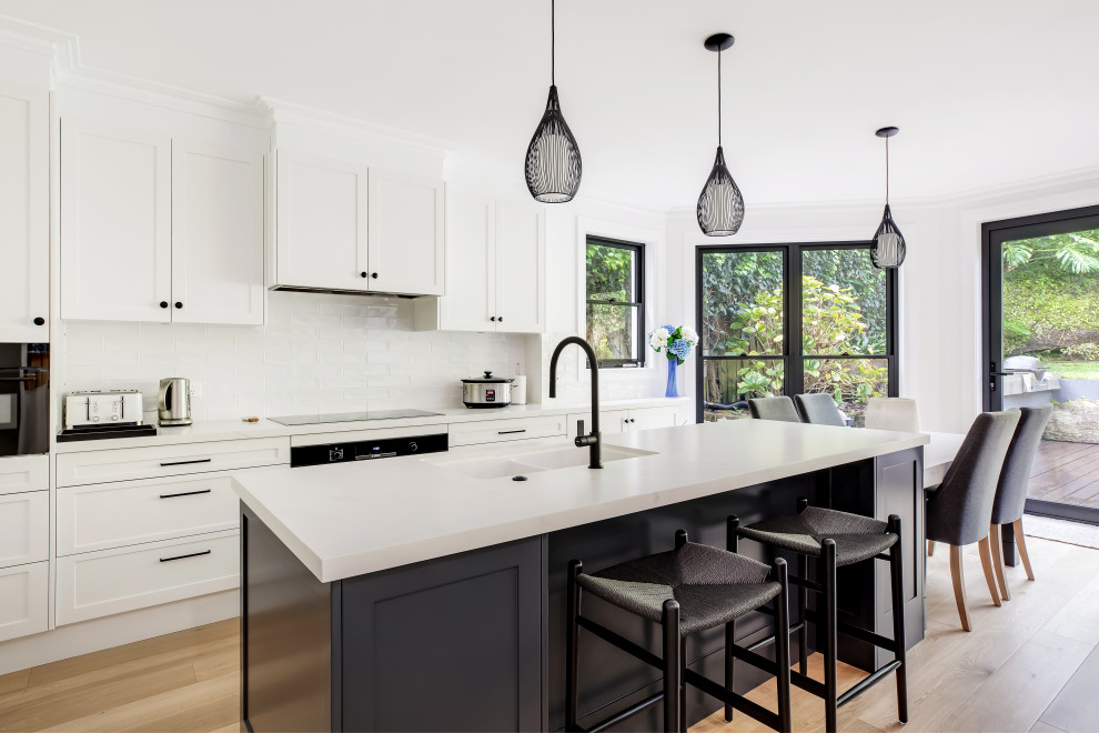 Design ideas for a transitional kitchen in Sydney.