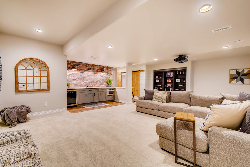 Design ideas for a large country fully buried basement in Denver with white walls, laminate floors, no fireplace and brown floor.