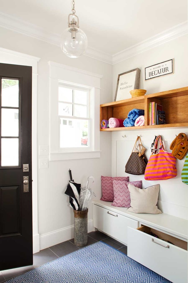 Photo of a small transitional mudroom in Atlanta with white walls, dark hardwood floors, a single front door and a black front door.