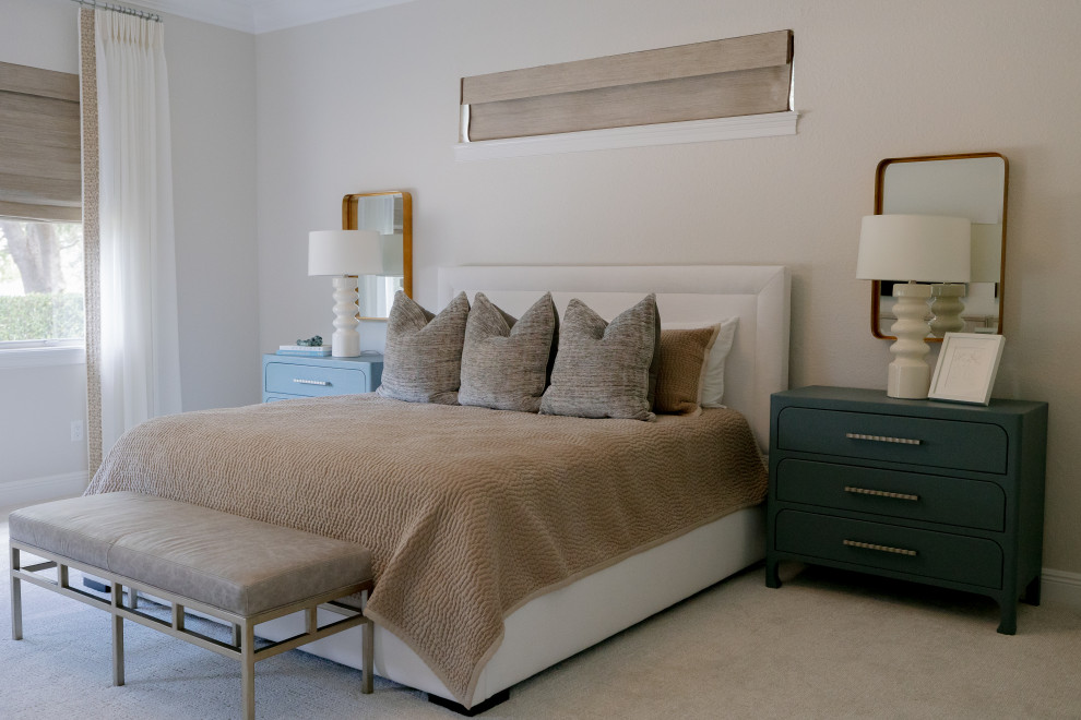 Design ideas for a mid-sized transitional master bedroom in Orlando with white walls, carpet and beige floor.