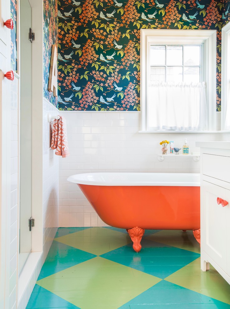 Inspiration for a mid-sized country kids wet room bathroom in Los Angeles with shaker cabinets, white cabinets, a claw-foot tub, subway tile, blue walls, painted wood floors, engineered quartz benchtops, a hinged shower door, white tile and multi-coloured floor.