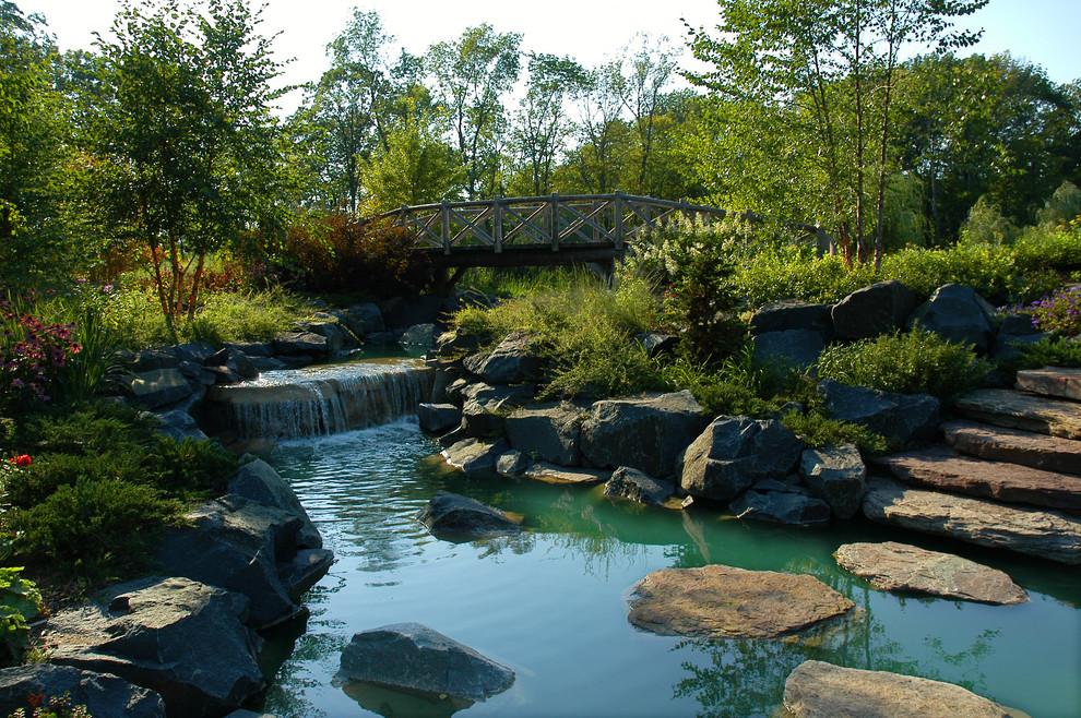 Country garden in Milwaukee with a water feature.