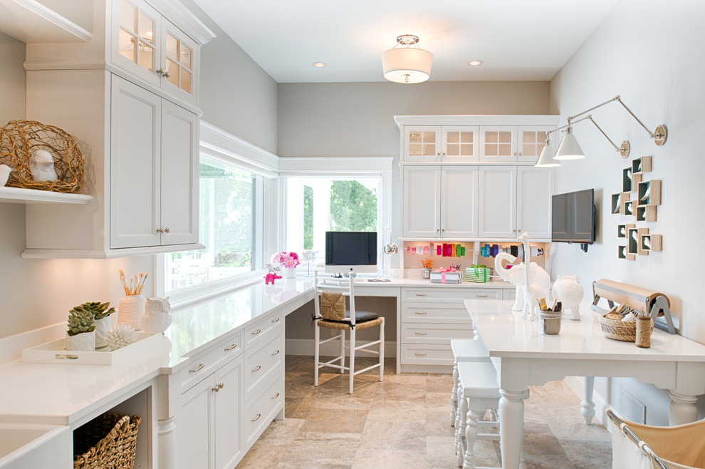 Traditional craft room in New York with grey walls and a built-in desk.