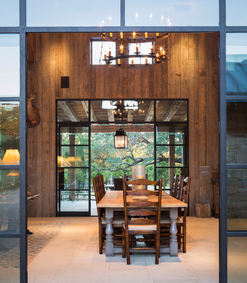 Inspiration for a large country dining room in Austin.