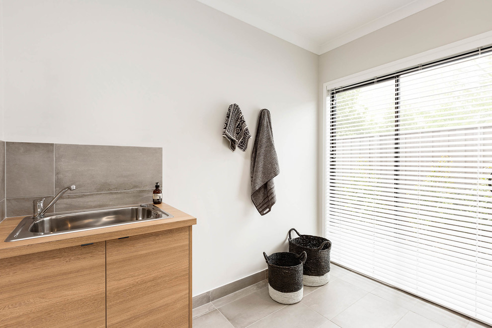 Photo of a contemporary laundry room in Melbourne.