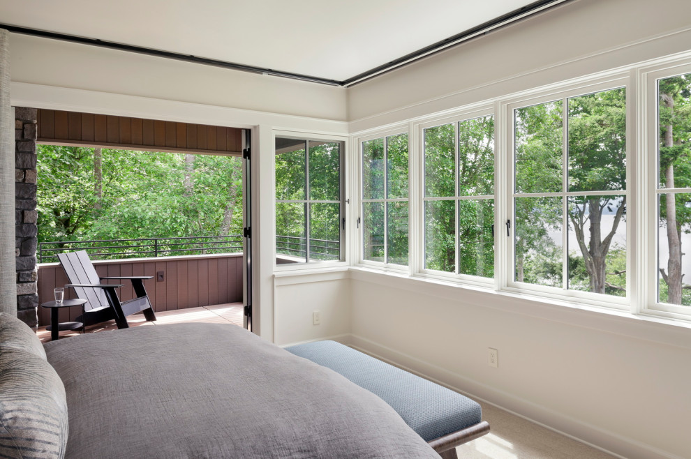 Design ideas for a farmhouse master bedroom in Seattle with white walls.
