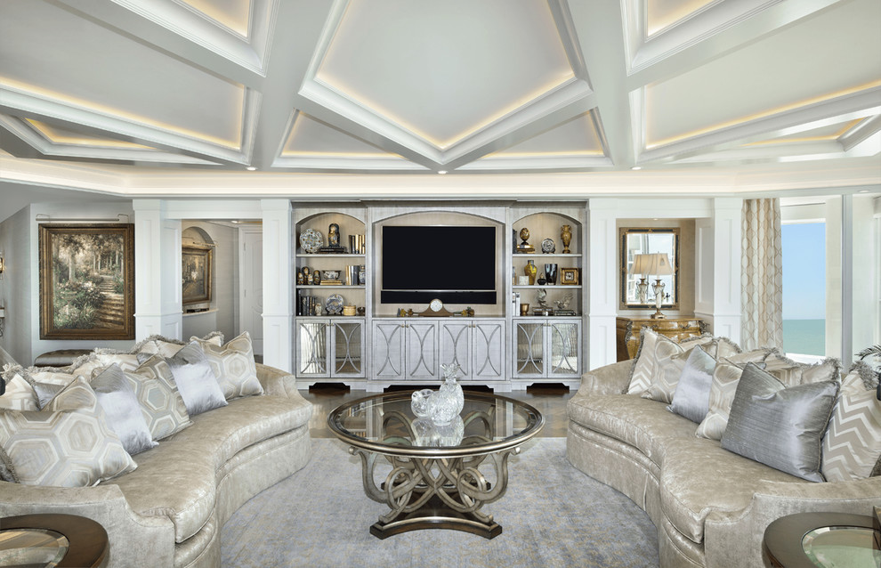 Inspiration for a traditional family room in Miami with no fireplace and a built-in media wall.