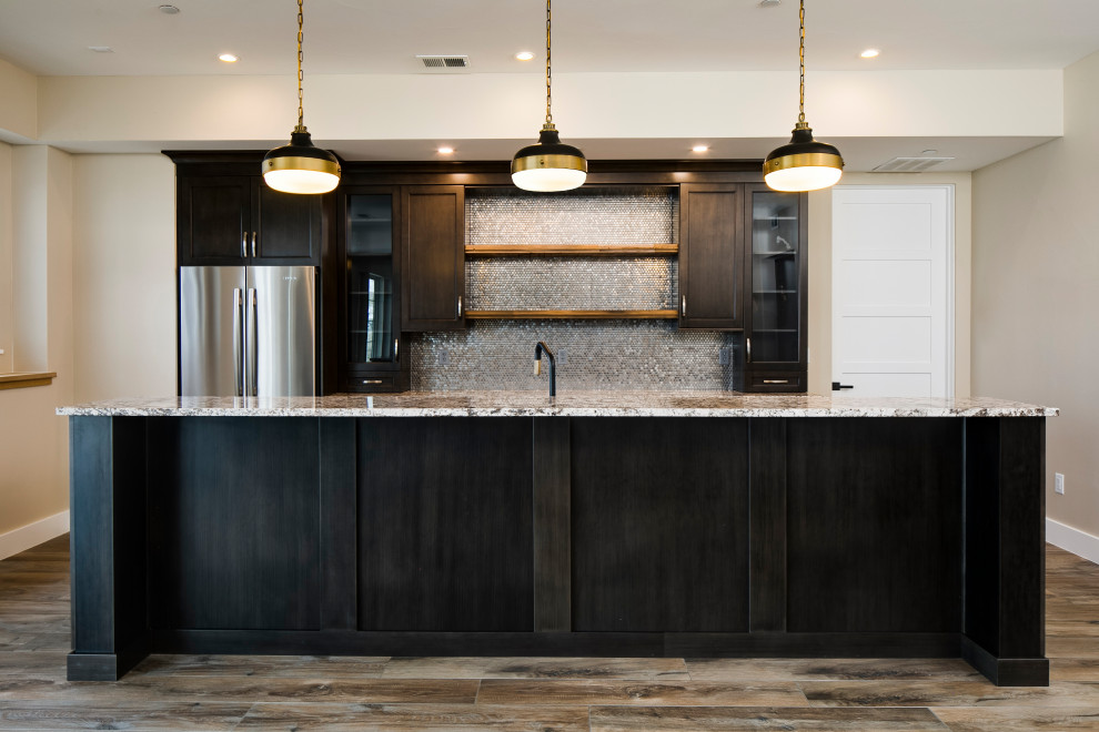 Example of a transitional kitchen design in Denver