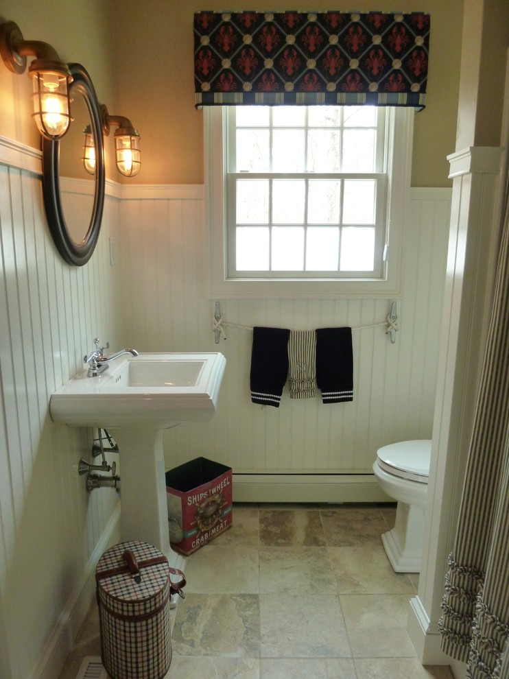 Mid-sized beach style 3/4 bathroom in Boston with a pedestal sink, a drop-in tub, a shower/bathtub combo, a two-piece toilet, beige tile, ceramic tile, beige walls and ceramic floors.