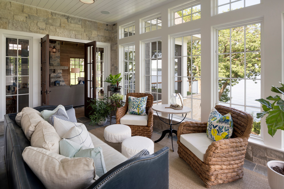 Photo of a mid-sized beach style sunroom in Minneapolis with a standard ceiling, grey floor, slate floors and no fireplace.