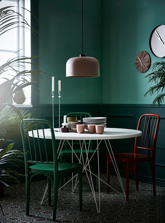 This is an example of an eclectic dining room in Stockholm.