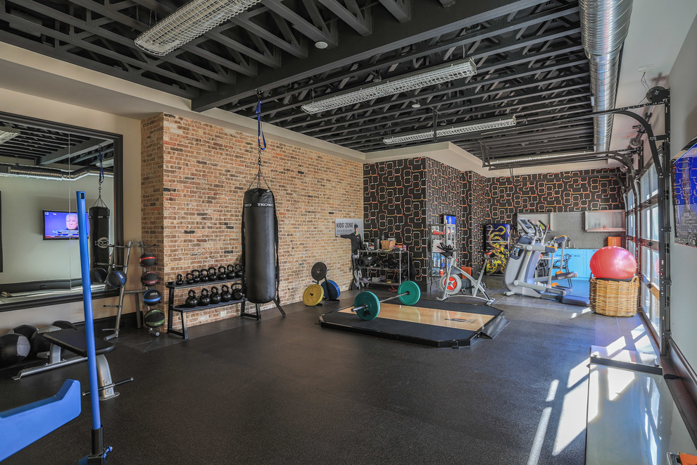 Industrial multipurpose gym in Dallas with multi-coloured walls and grey floor.
