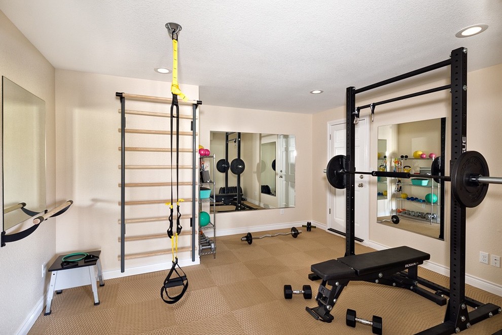 Inspiration for a mid-sized transitional home weight room in Denver with beige walls, carpet and beige floor.