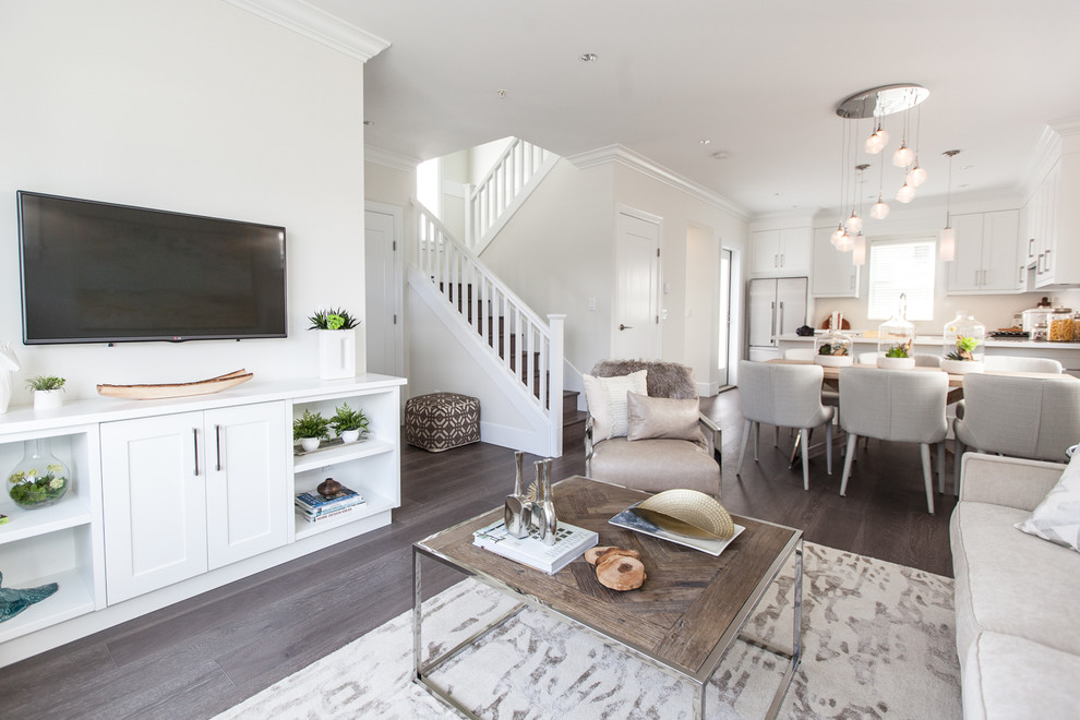 Example of a transitional home design design in Vancouver