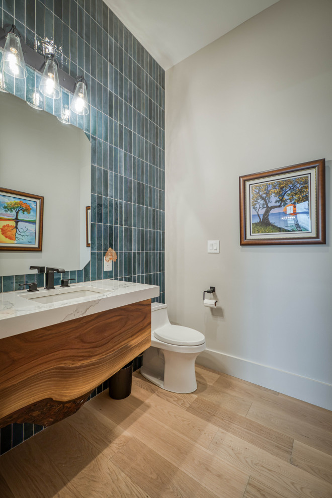 Inspiration for a contemporary powder room remodel in Charlotte