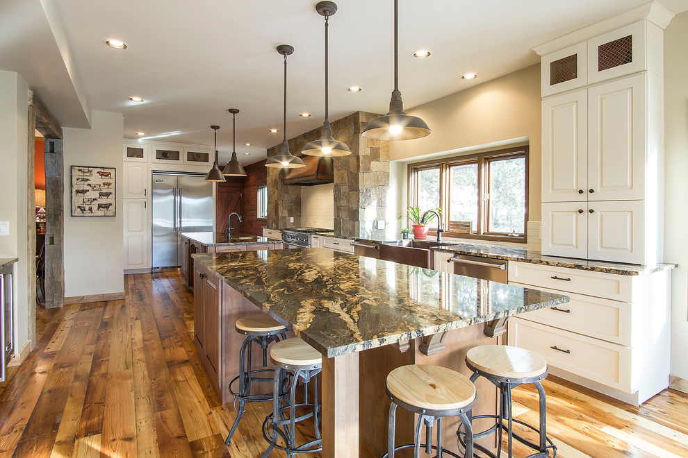 Example of a mountain style kitchen design in Denver