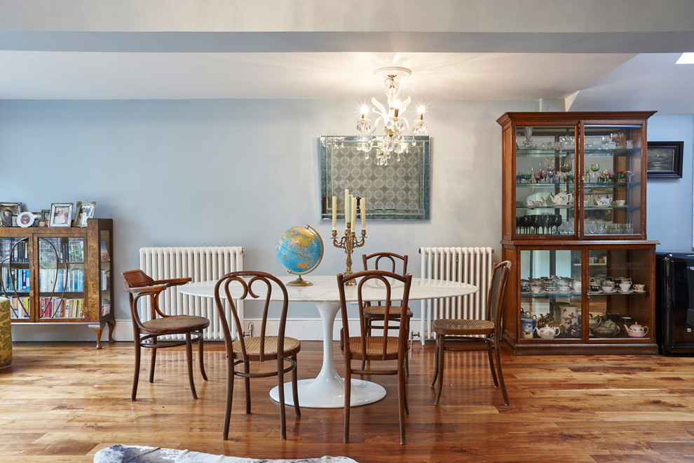 Design ideas for a large traditional open plan dining in London.