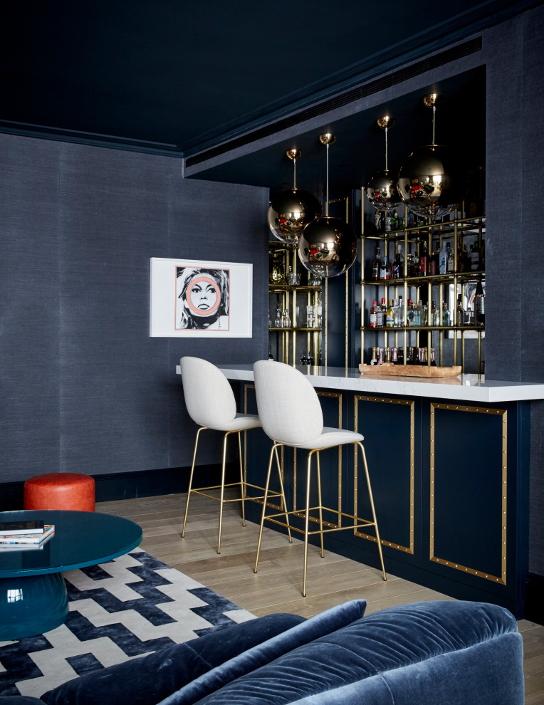This is an example of a transitional home bar in London.