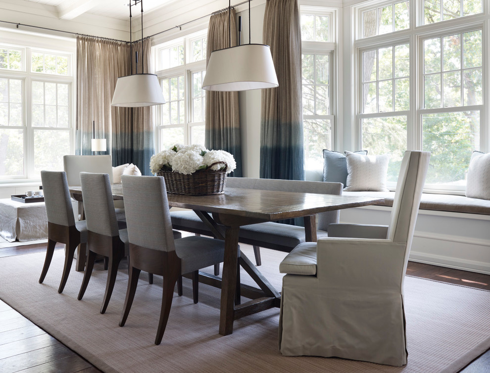 Inspiration for a transitional dining room in Chicago with white walls.