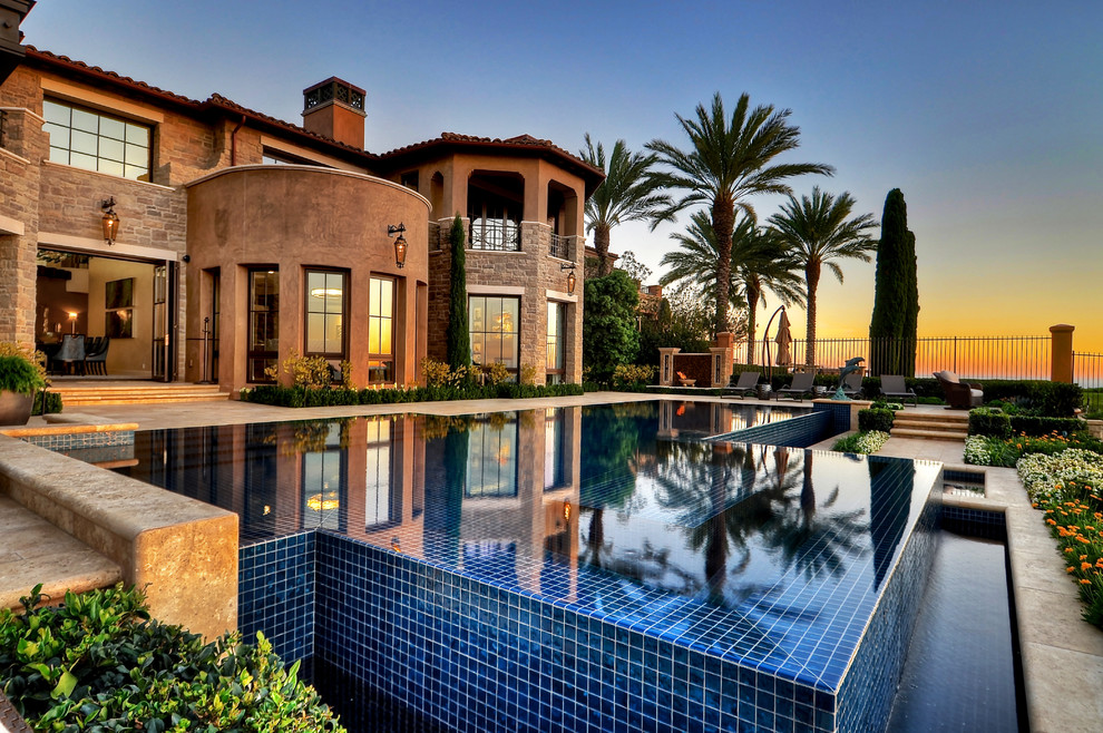 Example of a tuscan home design design in Orange County