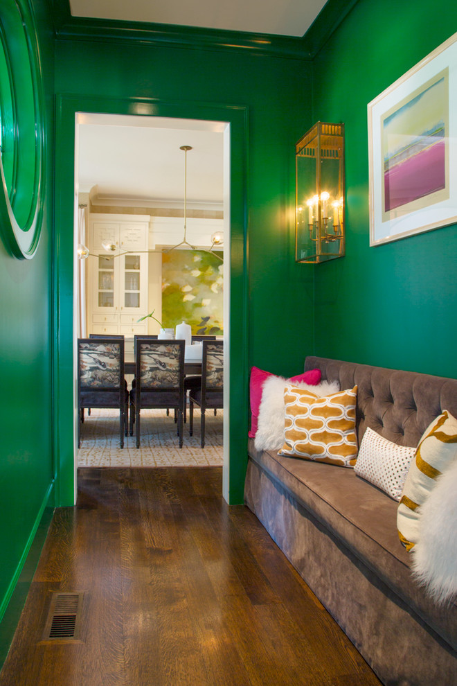 Photo of a transitional hallway in San Francisco with green walls and dark hardwood floors.