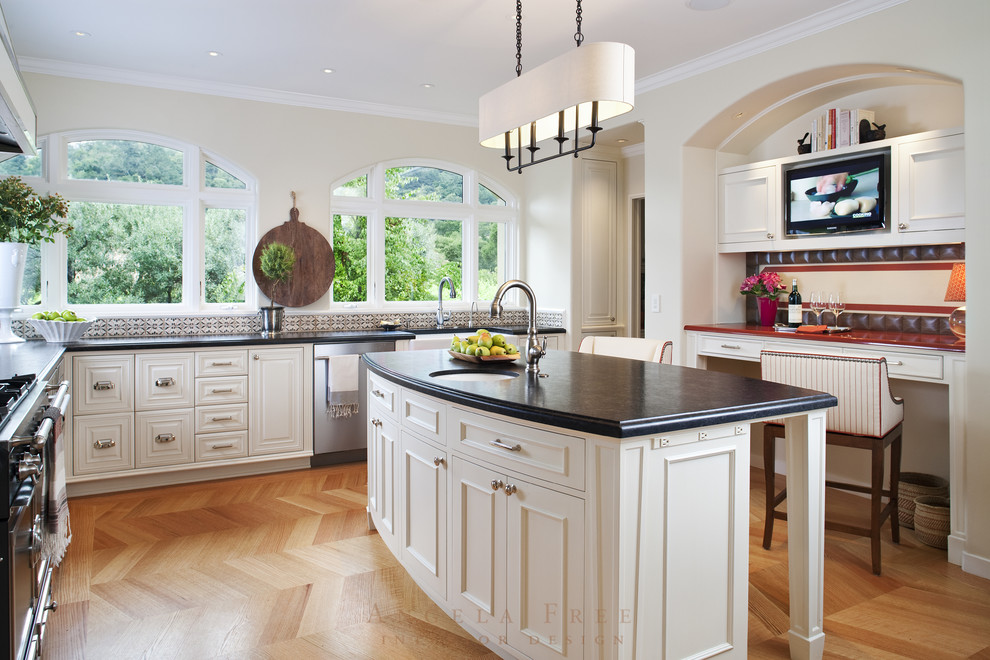 Photo of a traditional kitchen in San Francisco with raised-panel cabinets, white cabinets and ceramic splashback.
