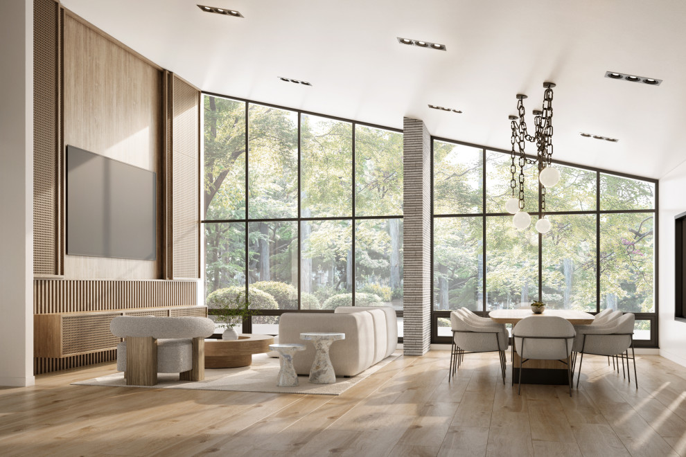 This is an example of a large modern open plan dining in Miami with beige walls, light hardwood floors, no fireplace, beige floor and panelled walls.