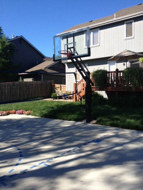 Large traditional backyard partial sun outdoor sport court in Kansas City.