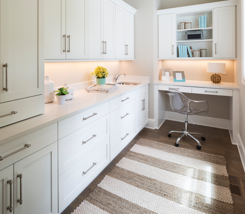 Mid-sized transitional single-wall medium tone wood floor kitchen pantry photo in Minneapolis with an undermount sink, shaker cabinets, white cabinets and an island