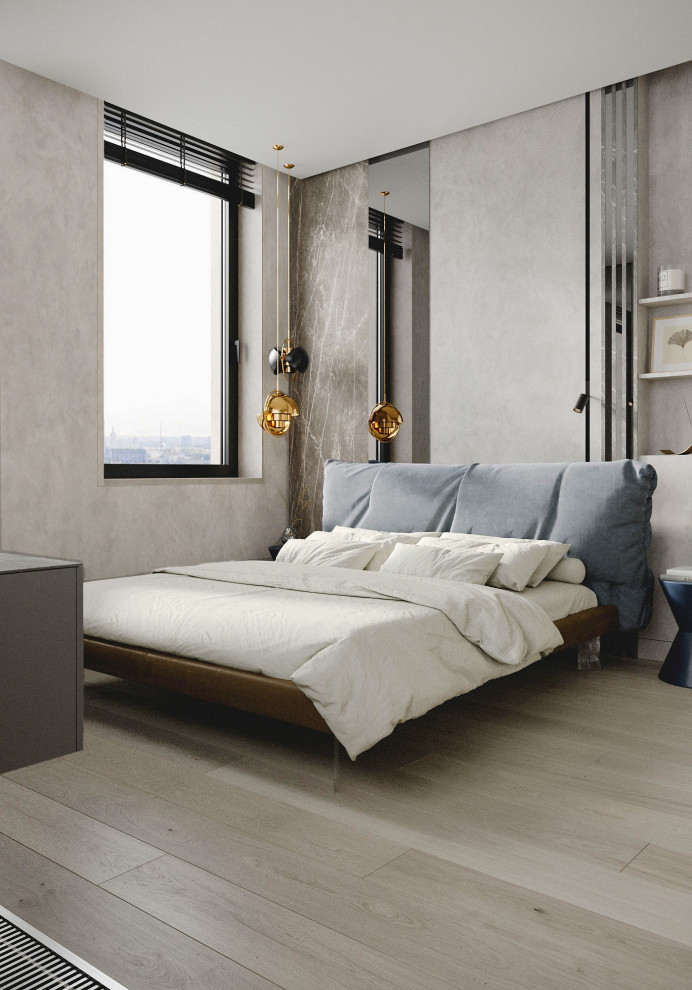 Imagen de dormitorio principal actual de tamaño medio con suelo de madera clara