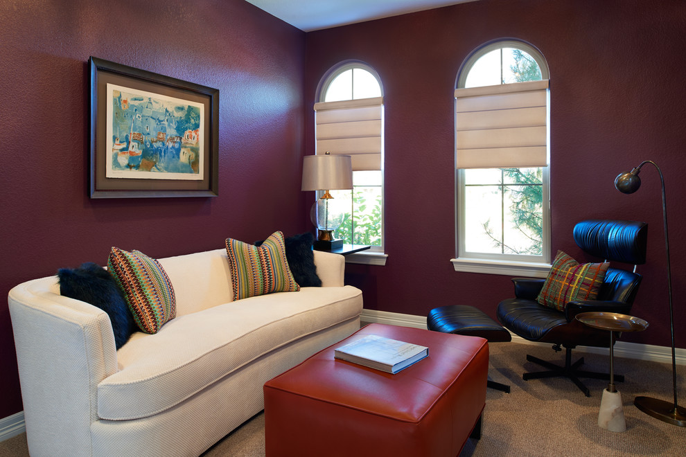 Photo of a transitional living room in Denver with purple walls and carpet.