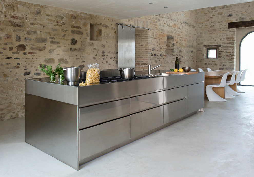 Photo of a mid-sized contemporary single-wall eat-in kitchen in Other with stainless steel cabinets and with island.