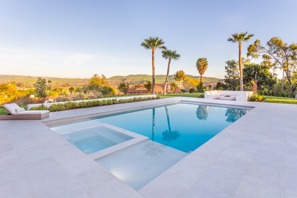 Photo of a contemporary backyard rectangular pool in Orange County.