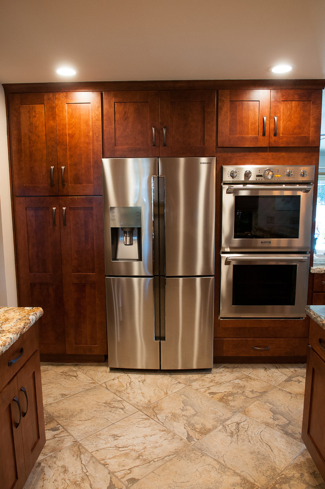 Example of a mid-sized mountain style kitchen design in Burlington