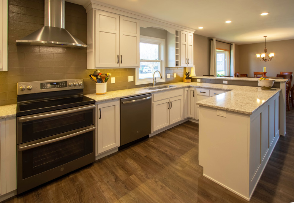 Kitchen - transitional kitchen idea with quartzite countertops, green backsplash and glass tile backsplash