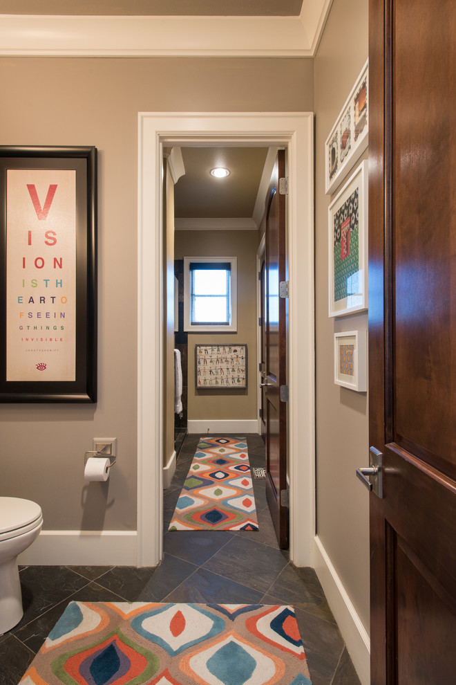 Example of a mid-sized transitional master corner shower design with recessed-panel cabinets, medium tone wood cabinets and a one-piece toilet
