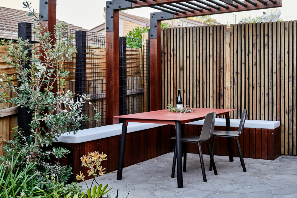 Inspiration for a contemporary patio in Melbourne with a pergola.