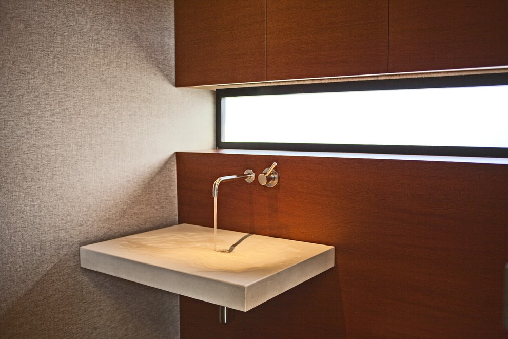 Inspiration for a modern bathroom in San Francisco with a wall-mount sink.