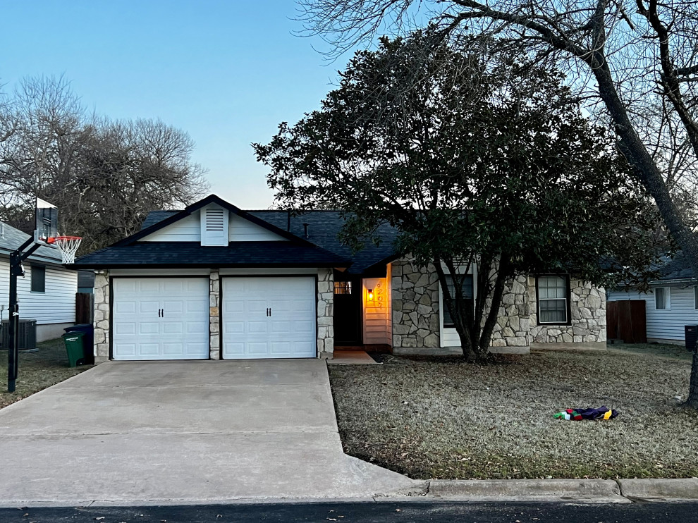 Just got a new black roof.Should I paint the garage doors black?