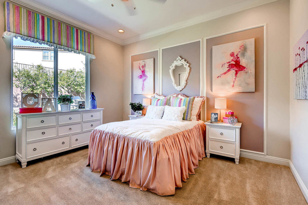 Photo of a mid-sized transitional kids' bedroom for kids 4-10 years old and girls in Las Vegas with beige walls and carpet.