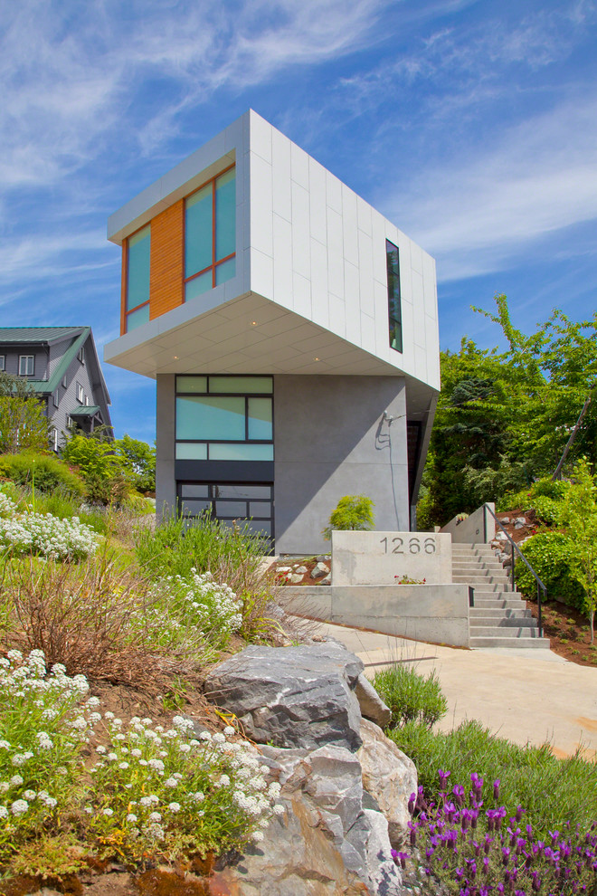 Trendy gray two-story mixed siding exterior home photo in Seattle