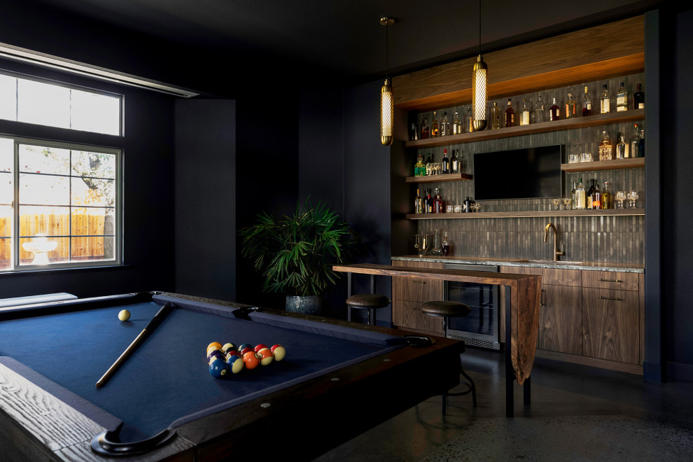 Inspiration for a large transitional enclosed concrete floor and blue floor game room remodel in Sacramento with blue walls